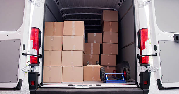 istock Professional Mover Transporting Furniture Boxes With Van 2224573337
