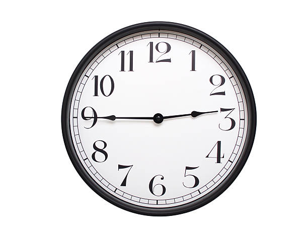 Round analog wall clock with a black frame, white face, and bold black numerals. showing  02:45 or 14:45. Isolated on a white background. Ideal for time-related themes.