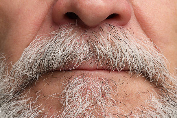 istock Man with mustache and beard, closeup view 2224578330