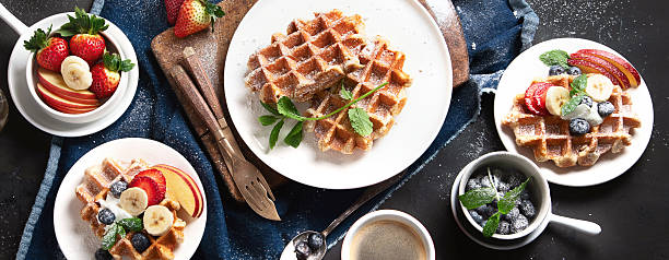 istock Traditional belgian waffles with fresh berries 2224578869