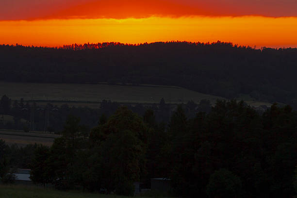 Late evening view looking over a typically english rolling landscape. Photographed looking towards the village of Braunston in Northamptonshire. Colour, horizontal with lots of copy space.