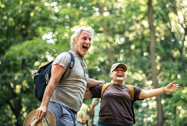 istock Active Seniors and friends  chatting during a nature hiking 2224592462