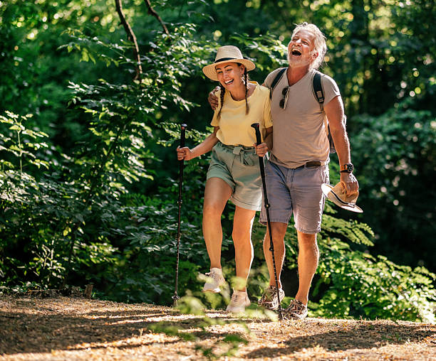 istock Active Seniors and friends  chatting during a nature hiking 2224593174