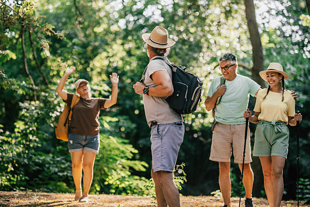 istock Active Seniors and friends  chatting during a nature hiking 2224593201