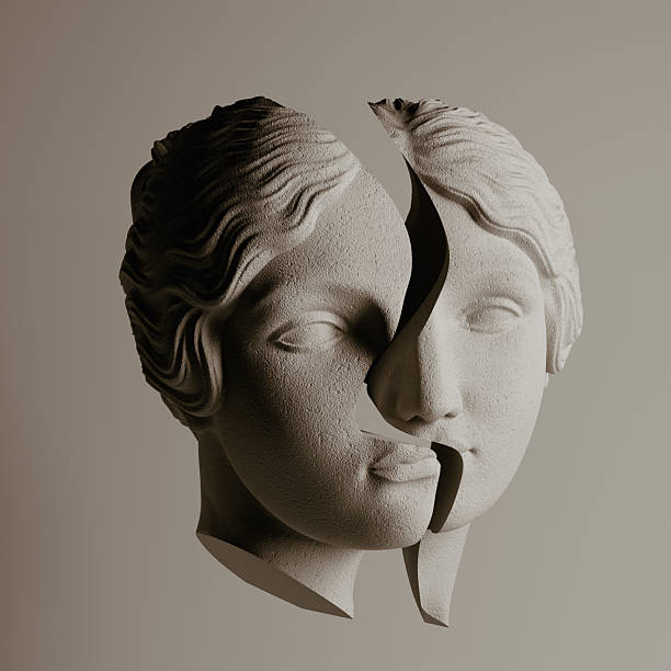 two caryatide faces