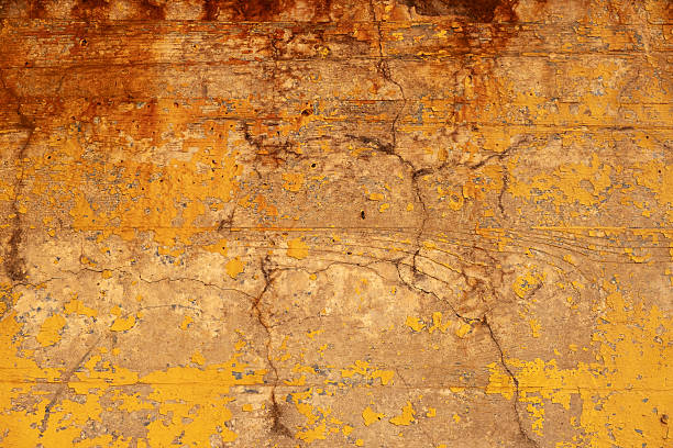 istock Rust corrosion surface on metal with deep orange and red tones forming rugged abstract texture useful for backgrounds and texture designers. Texture 2224594488
