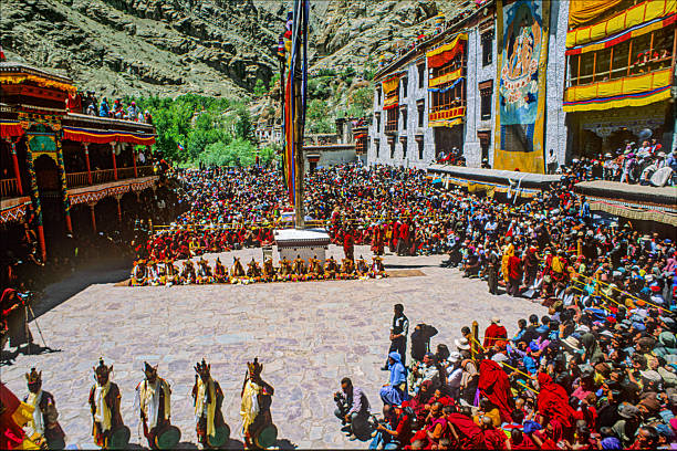 Ladakh, India - June, 2004: Hemis Festival, celebrates the birthday of Guru Padmasambhava. The Chham Dance,  are the masked dances, which show the victory of good over evil.  During the Tibetan Year of Monkey, which occurs every 12 years, will be unveiling of the famous Thangka