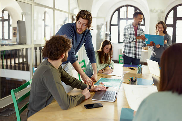 istock Creative colleagues working on a meeting at casual office. 2224598868