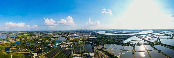 istock Industrial power generation facility with high voltage lines 2224600966