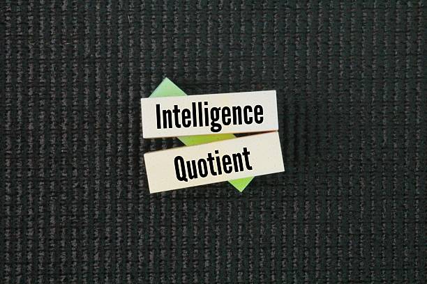 istock Colored paper with the word Intelligence Quotient. total score derived from a set of standardized tests or subtests designed to assess human intelligence. 2224602949