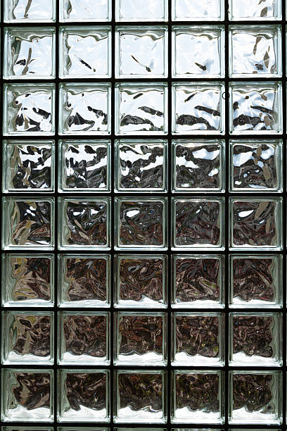 istock Opaque glass bricks wall with sunlight shinning through, wide angle, no people 2224605143