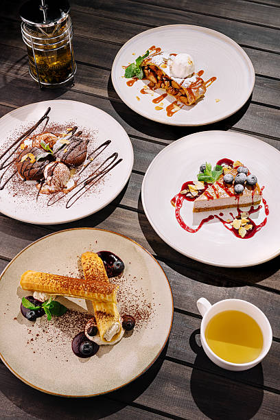 istock Desserts served at a trendy restaurant with elegant presentation at night 2224605229