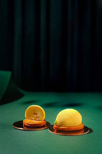 istock Creative dessert showcasing a lemon-inspired design on a green table 2224607073