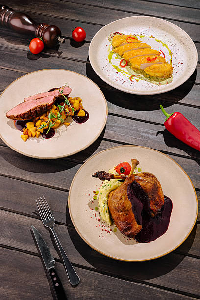 istock Elegant gourmet dishes served on stylish plates at a restaurant table setting 2224608303