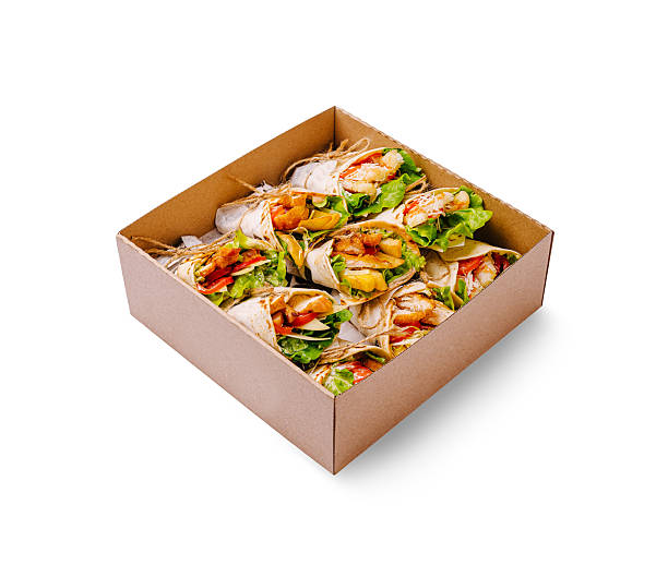istock Delicious assortment of fresh wraps served in a box for a gathering 2224608325