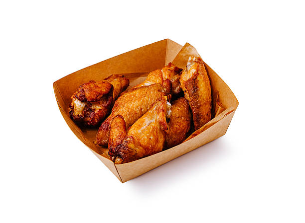 istock Delicious crispy chicken wings served in a takeout container 2224608527