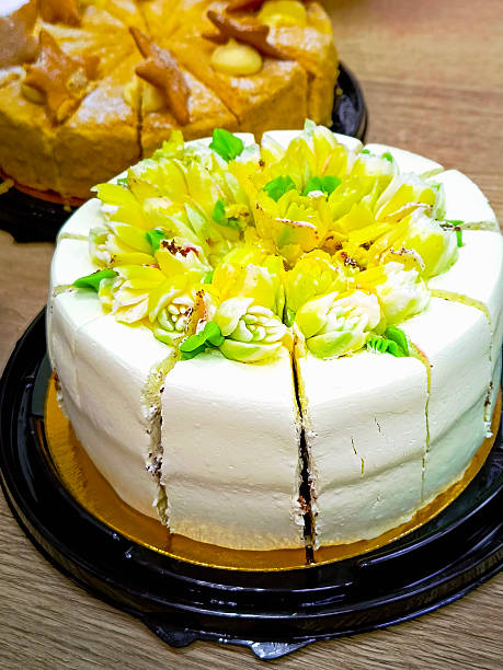 istock Sponge cake with cream close-up. Vertical photo. 2224609704
