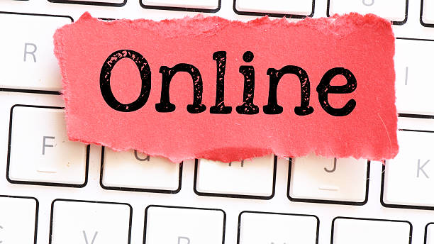 istock Online text on a red piece of paper. 2224612818