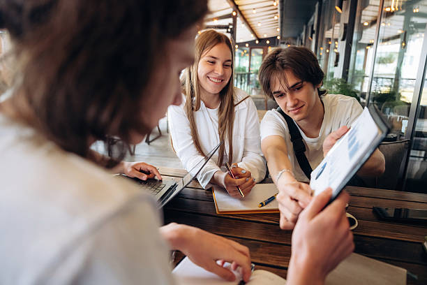 istock Data, information on the document. Group of young friends are in the cafe restaurant 2224614846