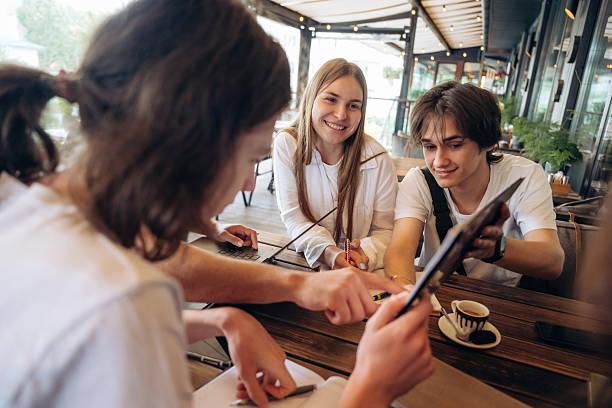 istock Data, information on the document. Group of young friends are in the cafe restaurant 2224614877