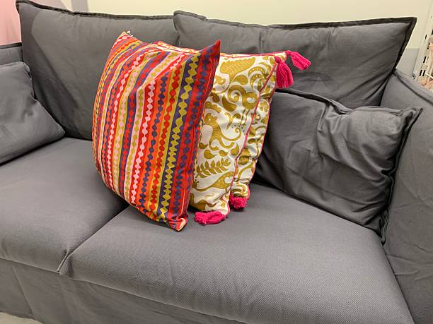 istock Gray Sofa with Decorative Colorful Throw Pillows 2224615288