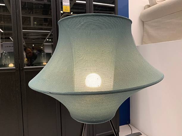 istock Modern Green Fabric Lampshade with Soft Ambient Glow 2224615556