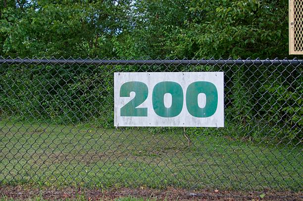istock Outfield fence at a ball field 2224615742
