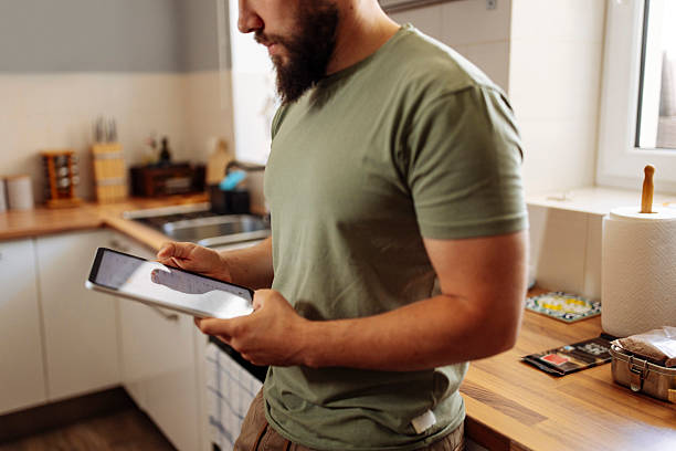 istock Man analyzing stock market data at home 2224615993