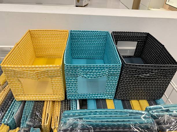 istock Yellow, Blue, and Black Fabric Storage Bins with Geometric Patterns 2224617325