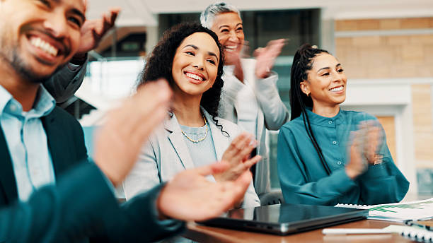 istock Clapping hands, meeting and business people in office with achievement, presentation or target. Happy, cheering and team of financial managers with applause for good news on company investment. 2224622169