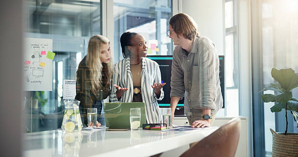 istock Discussion, laptop or people with project or teamwork for social media subscription or business meeting. Planning, SEO analysts or brainstorming for startup, online growth report or budget review 2224624945