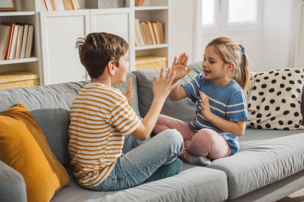 istock Happy children plying on sofa 2224625806