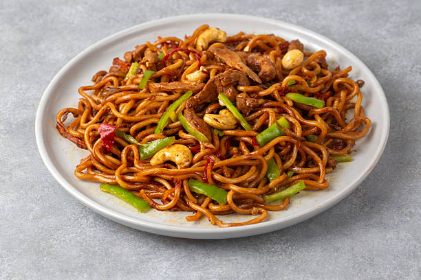 istock Chicken, pepper and cashew noodles 2224626157