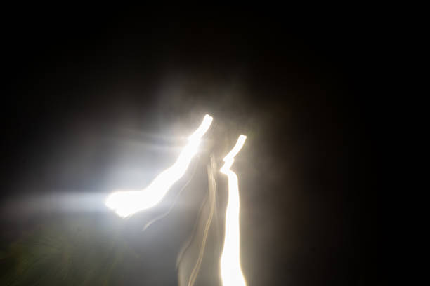Beautiful abstract background with bright, white rays of light moving in. Copyspace concept. Photographic effect. Texture.