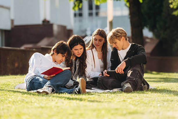 Group of students are near university together.