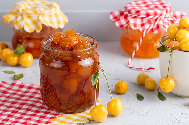 istock Delicious yellow cherry jam in a jar 2224632407