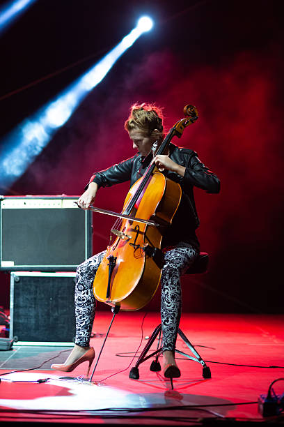 istock Female cellist playing cello on the rock concert 2224635713