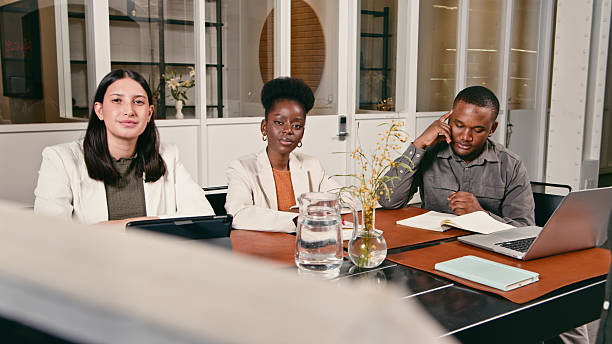 istock Professional Team Meeting With Colleagues Collaborating in a Modern Office Setting 2224640903