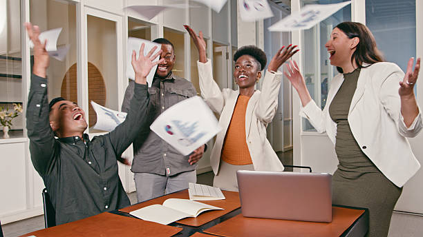 istock Excited Team Celebrating Success in a Collaborative Business Office Environment 2224642736