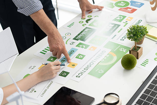 istock A diverse business team analyzing environmental charts and graphs in a collaborative meeting to create sustainable strategies in a modern office. 2224646087