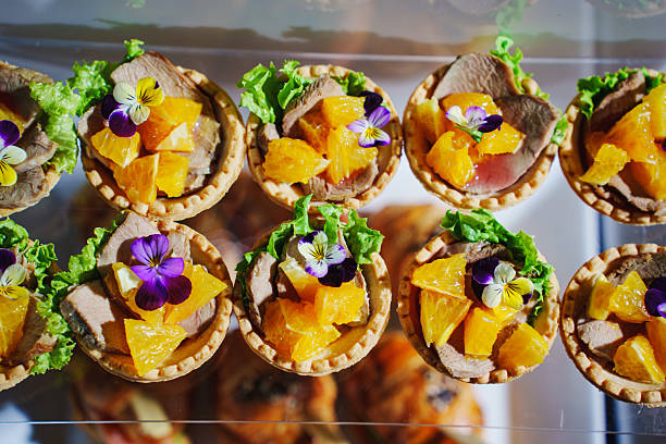 istock Brightly colored gourmet tartlets with fresh ingredients in a display 2224646460