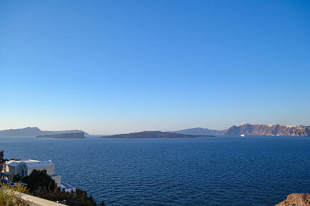 Santorini, also known as Thera, is a Greek island in the Aegean Sea, famous for its unique landscape, whitewashed villages, and stunning sunsets