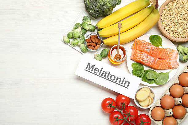 istock Word Melatonin and different products on white wooden table, flat lay. Space for text 2224655109