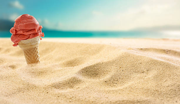 istock Ice cream on beach sand – summer treat, dessert and seaside refreshment concept. 2224655234