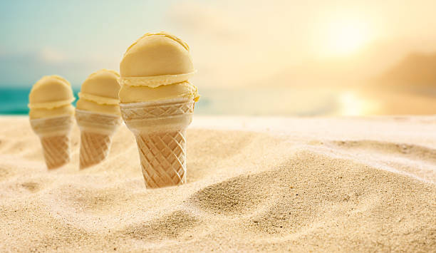 istock Ice cream on beach sand – summer treat, dessert and seaside refreshment concept. 2224655252