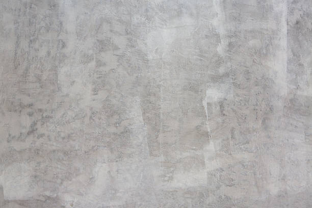Wall background with rough burnt cement finish.