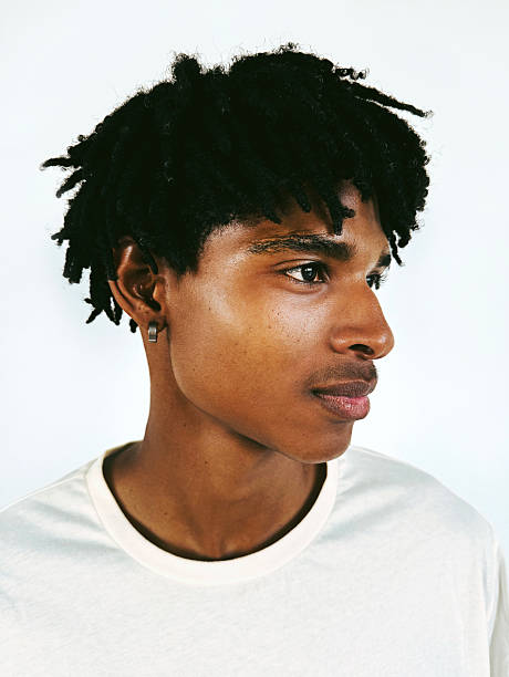 istock Young Confident Man with Natural Curly Hair 2224656925