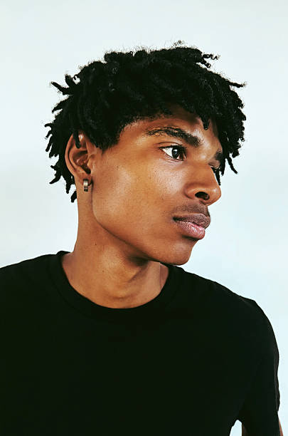 istock Thoughtful Young Man with Natural Black Hair 2224656937