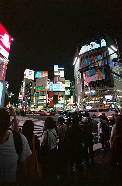 istock Waiting to Cross—Silhouettes & Neon 2224660997