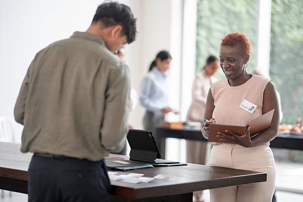 istock Corporate Networking Event with Professionals Collaborating and Engaging in a Modern Setting 2224662197